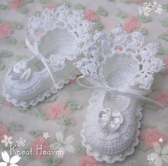 White antique lace crochet baby booties with crocheted-in pearl beads
