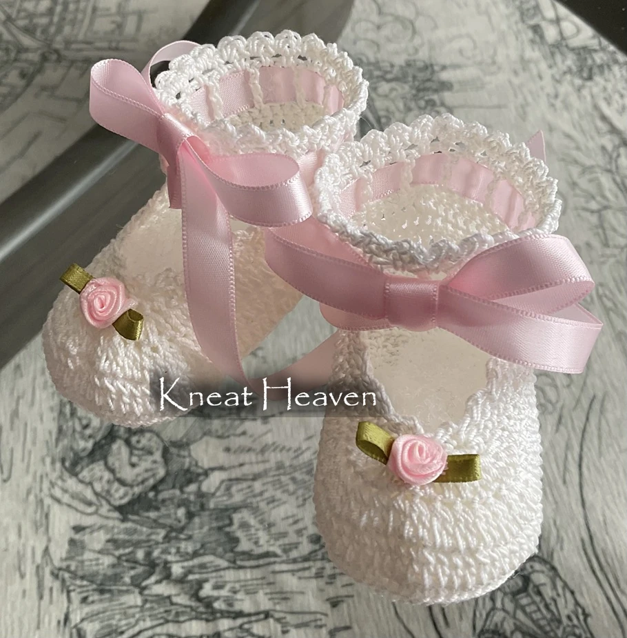 Handmade cotton crochet Mary Jane baby booties with ribbon roses and laces